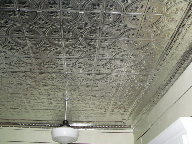 Tin ceiling and old light fixture