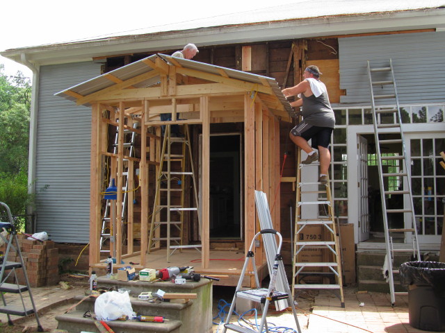 Installing a metal roof to the mudroom