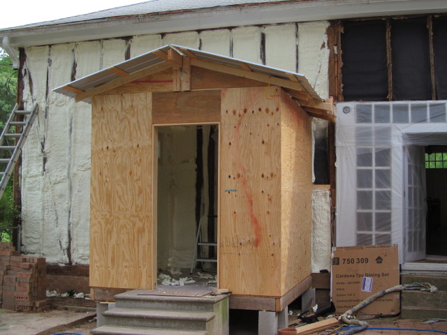 Insulation sprayed in and around mudroom addiiton