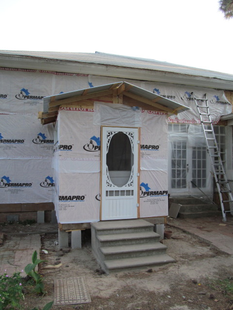 Moisture and air barrier installed to house