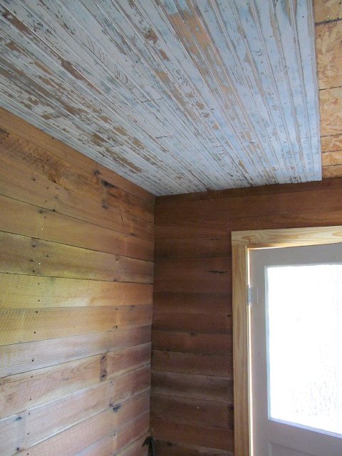 Installing the shiplap and beadboard in the mudroom