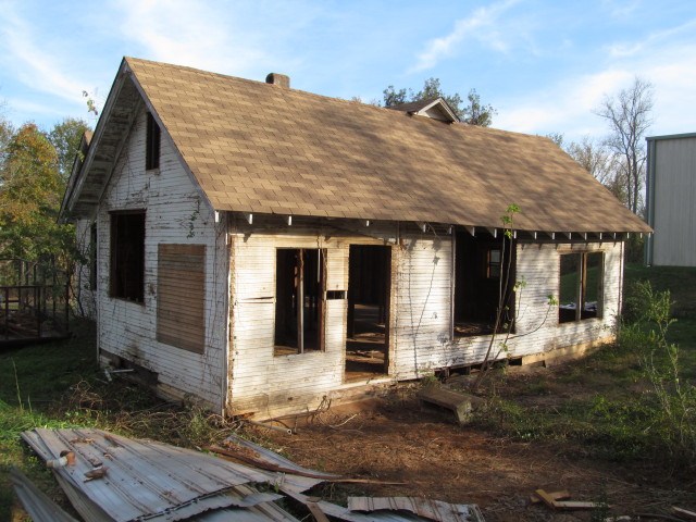 windows and tin shed removed from back of house