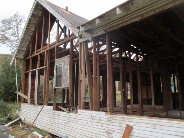 most of siding removed from west side of house