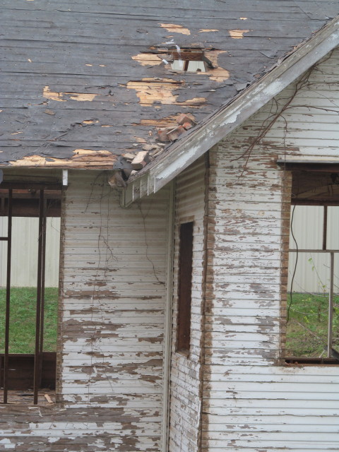 a hole where the brick chimney used to be