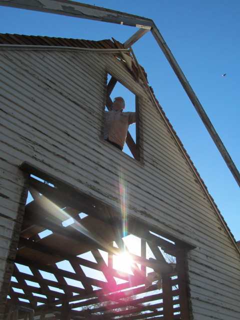 preparing to remove the siding from the peak