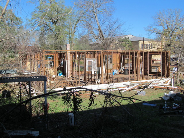 siding removed reveals the "bones" of the house