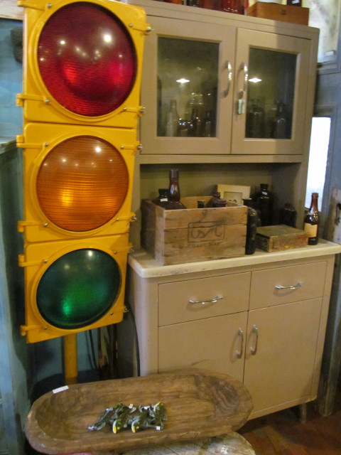 Industrial stepback cabinet and old stop sign- Living Vintage