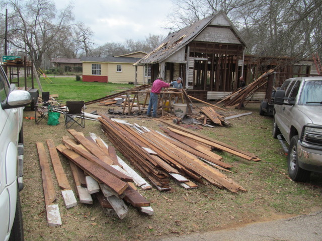 Pile of wood denailed and ready for cutting - Living Vintage