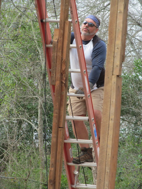 my sexy husband working on removing roof rafters - Living Vintage