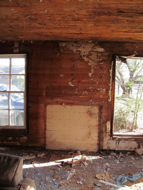 walls reveal evidence of an old fireplace