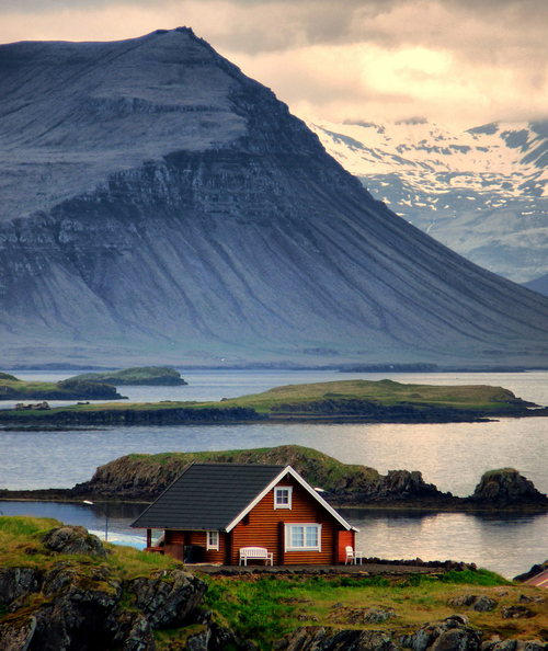 little red house with an inspiring view