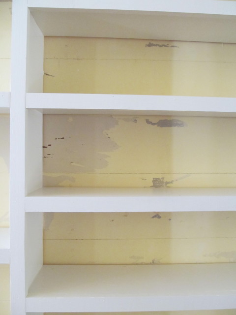 paint peels from walls as I'm removing the painter's tape