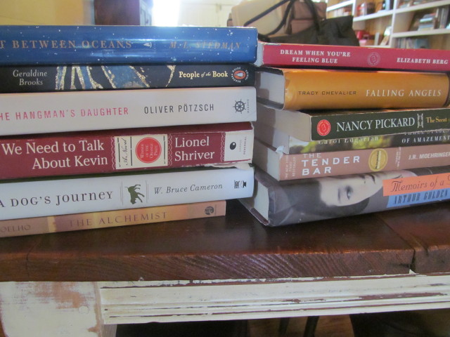 stack of new, used books