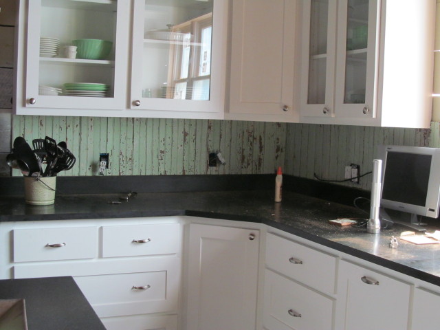 almost done with installing the reclaimed beadboard backsplash