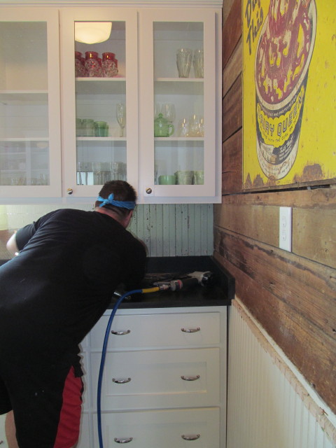 installed the reclaimed green beadboard backsplash