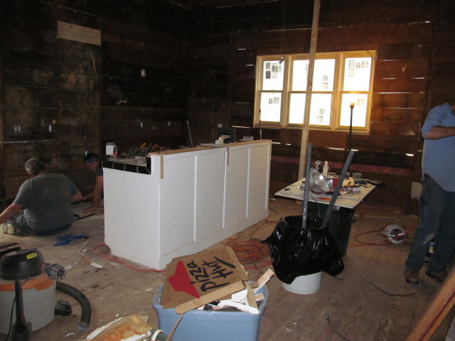 repairing the subfloors, floors, and doing electrical work