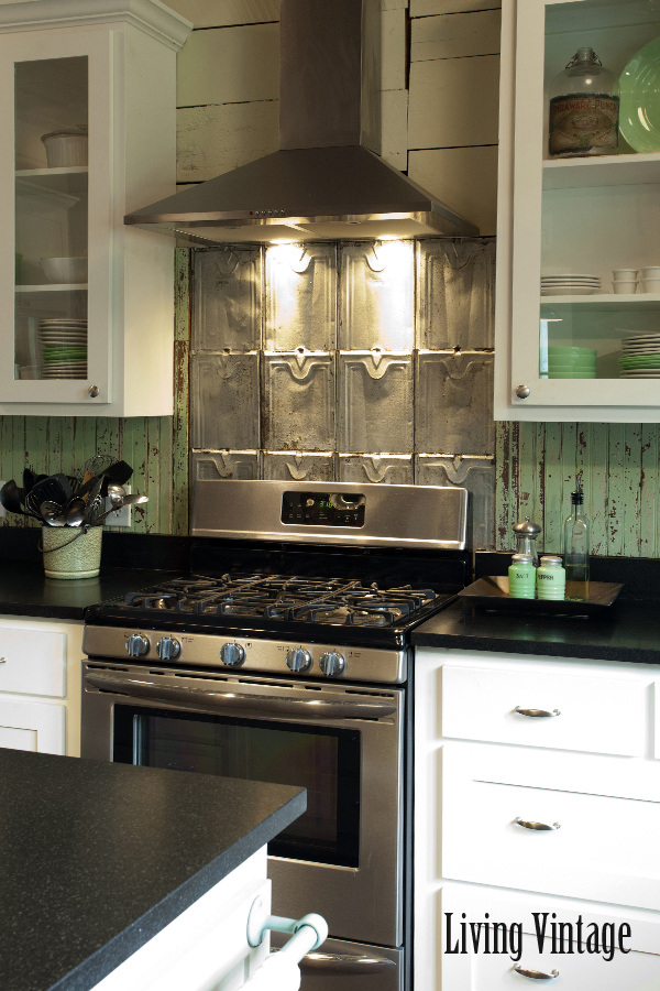 Living Vintage kitchen reveal - backsplash made from salvaged roof tin and beadboard