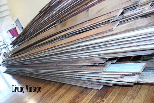Living Vintage - pile of old beadboard in our dogtrot breezeway