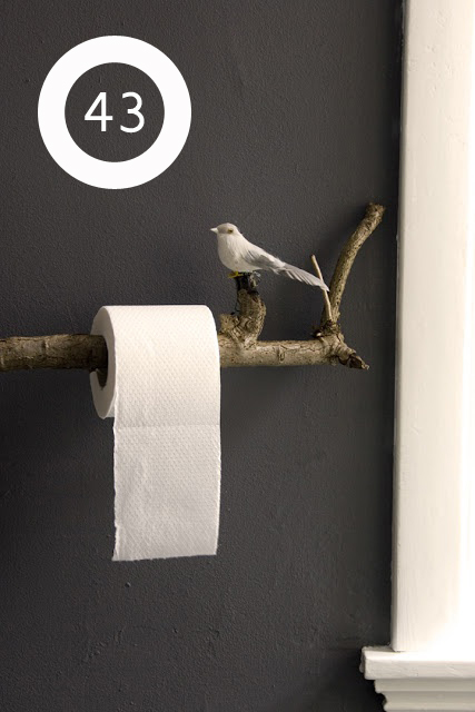 use a branch to hold a bathroom essential