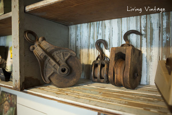 old pulleys that we may repurpose as lights one day - Living Vintage