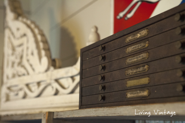 reclaimed corbels and an eyeglass parts cabinet - Living Vintage