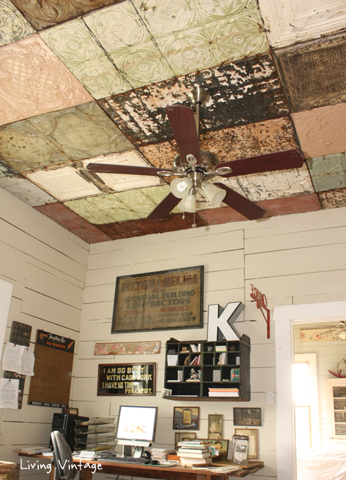 a gorgeous ceiling clad in a mosaic of antique ceiling tins @ Living Vintage