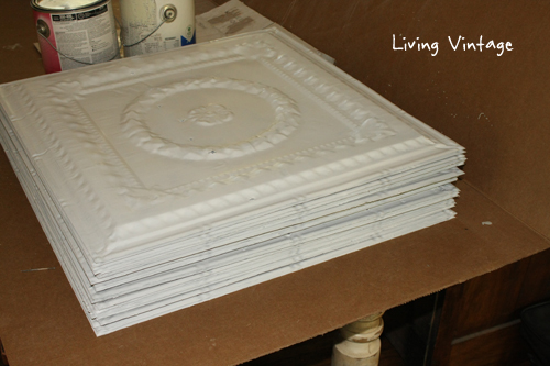 a stack of white ceiling tins - Living Vintage