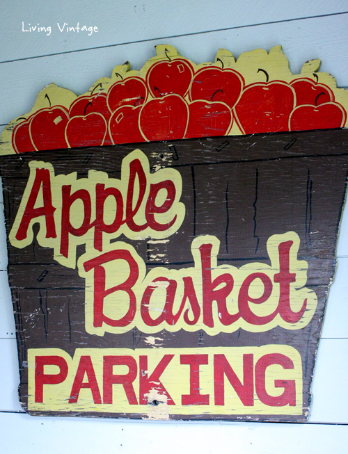 an old apple basket sign displayed in our renovated living room - click on over to see the full reveal!- Living Vintage