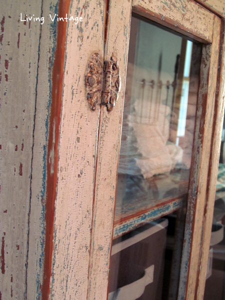 closeup of chippy paint storage cabinet - Living Vintage