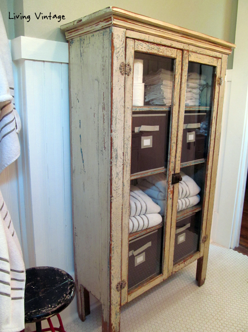 old cabinet used for bathroom storage - Living Vintage