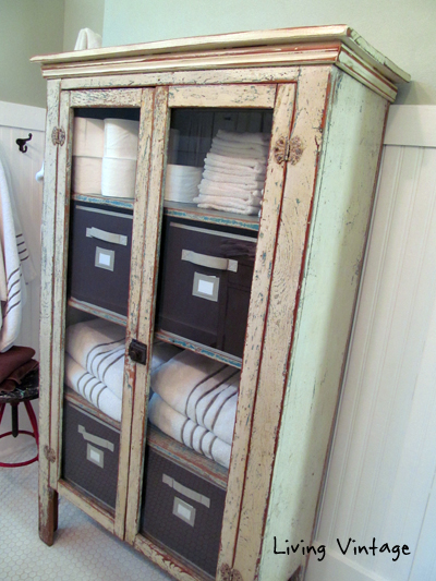 old chippy cabinet we use for bathroom storage - Living Vintage