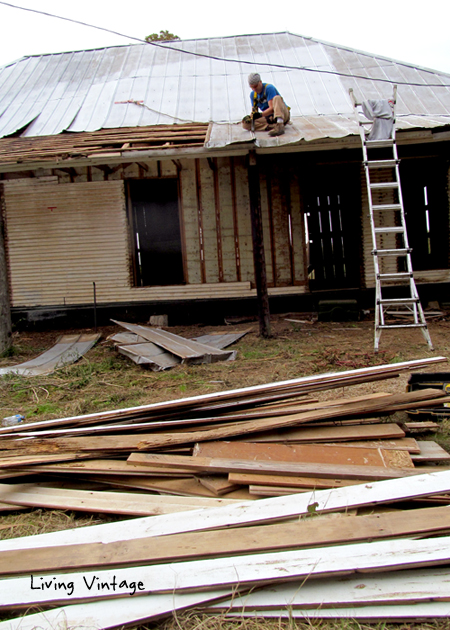 John skinning the porch roof