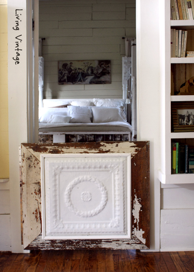 The dog gate we built using an ceiling tin and reclaimed wood - Living Vintage