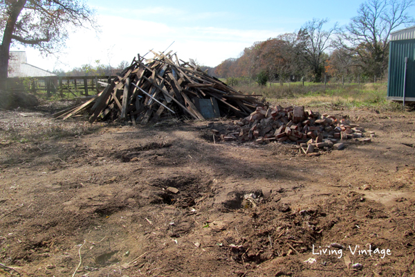 dirt, a pile of brick and unsalvageable wood is all that remains