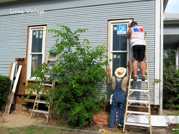 Mark and Mike replacing windows on the first side of our home
