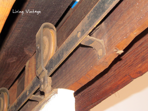 a closeup of the old pocket door hardware - Living Vintage