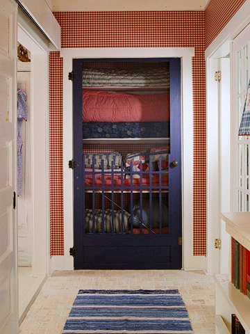 a linen closet with a screen door - featured on Living Vintage's Friday Favorites