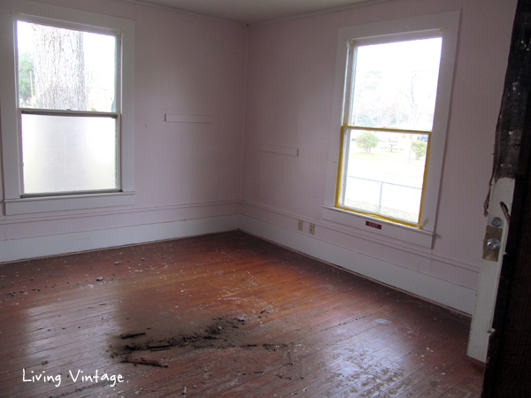 old pine hardwood floors discovered underneath the dirty carpet - Living Vintage
