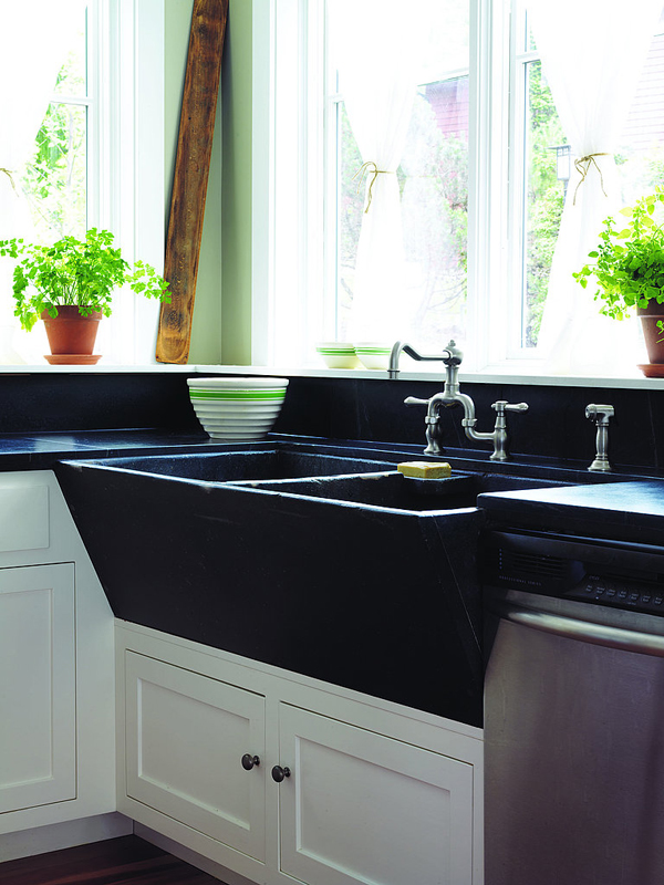 Susan used a salvaged soapstone utility sink for her remodeled kitchen.