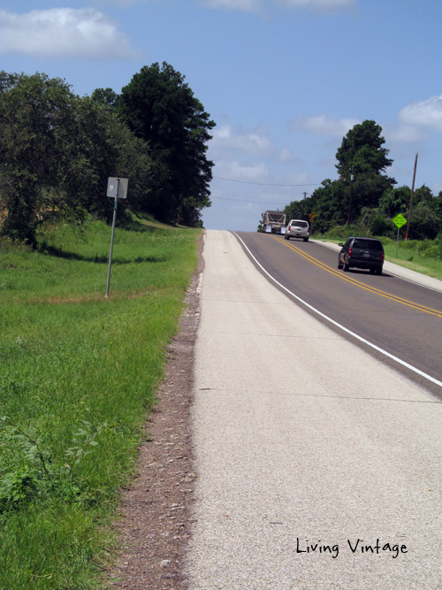 Fixing a flat on the side of a busy highway