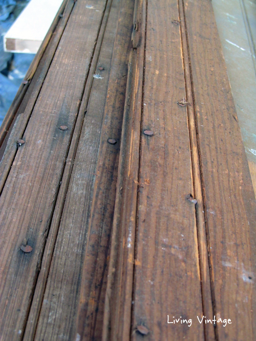 closeup of old brown beadboard