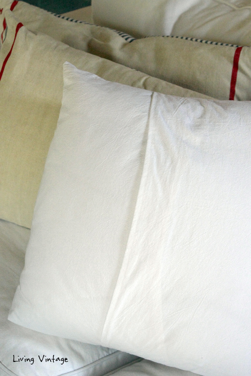 A neat way to purpose an old hankie!  Make a pillow!