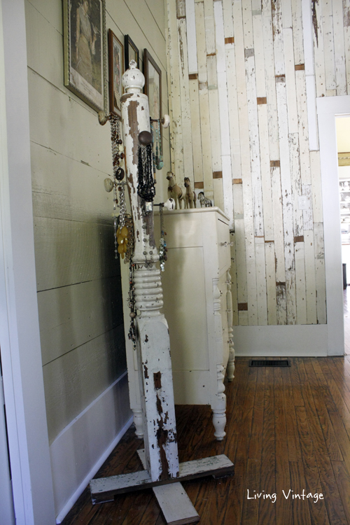 a jewelry tree using an old porch post, a reclaimed finial, some old doorknobs, and a few pieces of reclaimed wood 