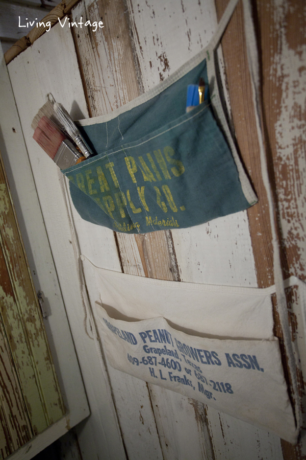 fun vintage carpentry aprons displayed in a fun, vintage laundry room