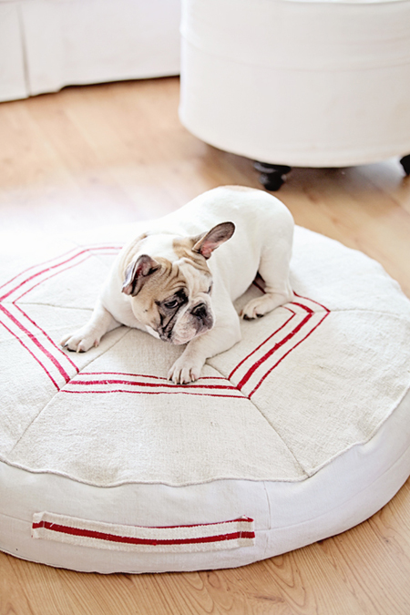 a dog bed made with vintage fabric