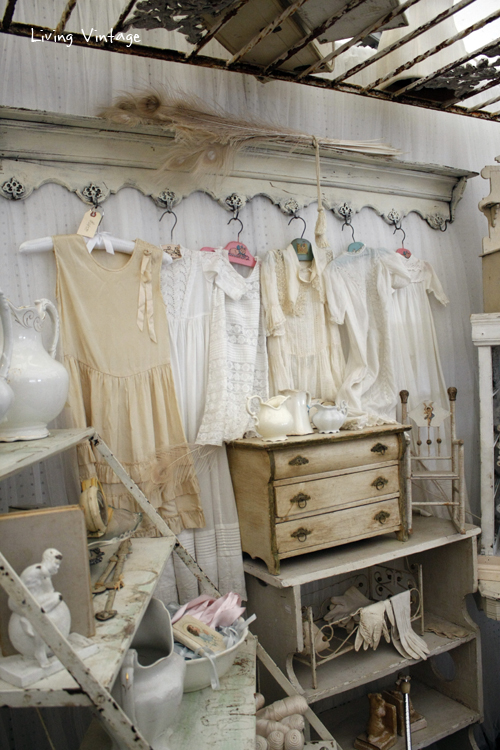 a collection of white, vintage clothing