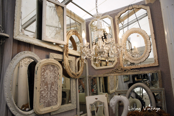 a large collection of beautiful antique mirrors