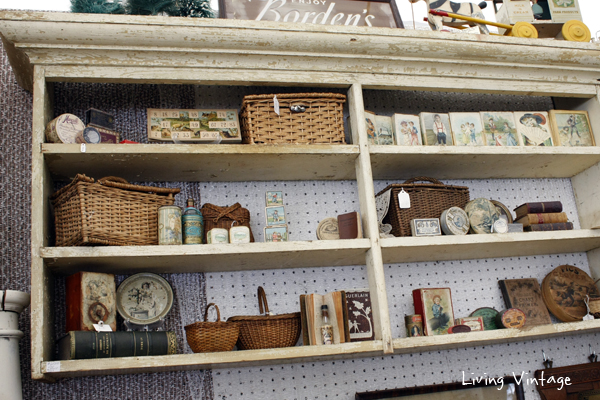 a small shelf displaying all kinds a wonderful things