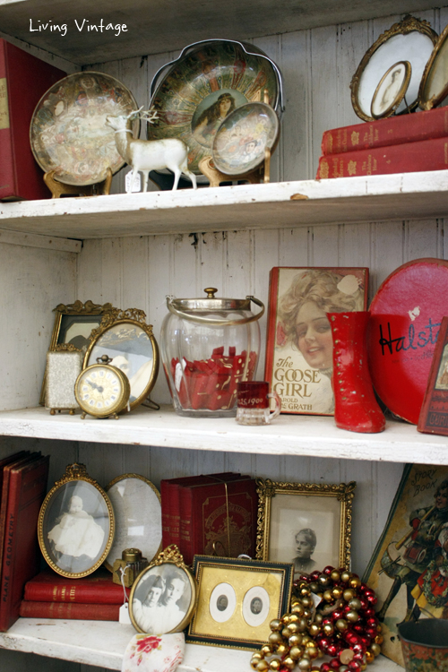 an arrangement of red and gold antiques