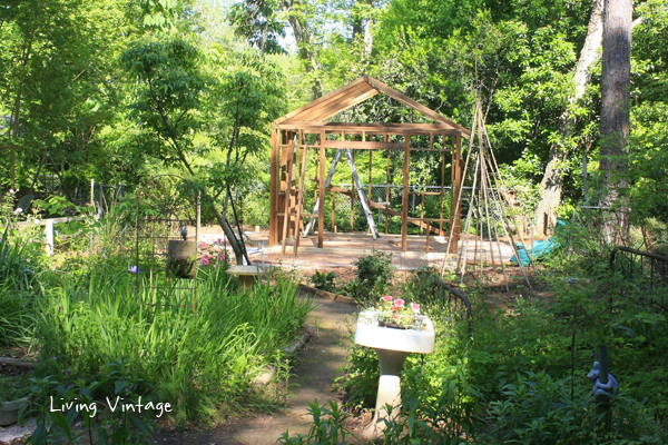 the shed is placed on the far side of Jenny's garden